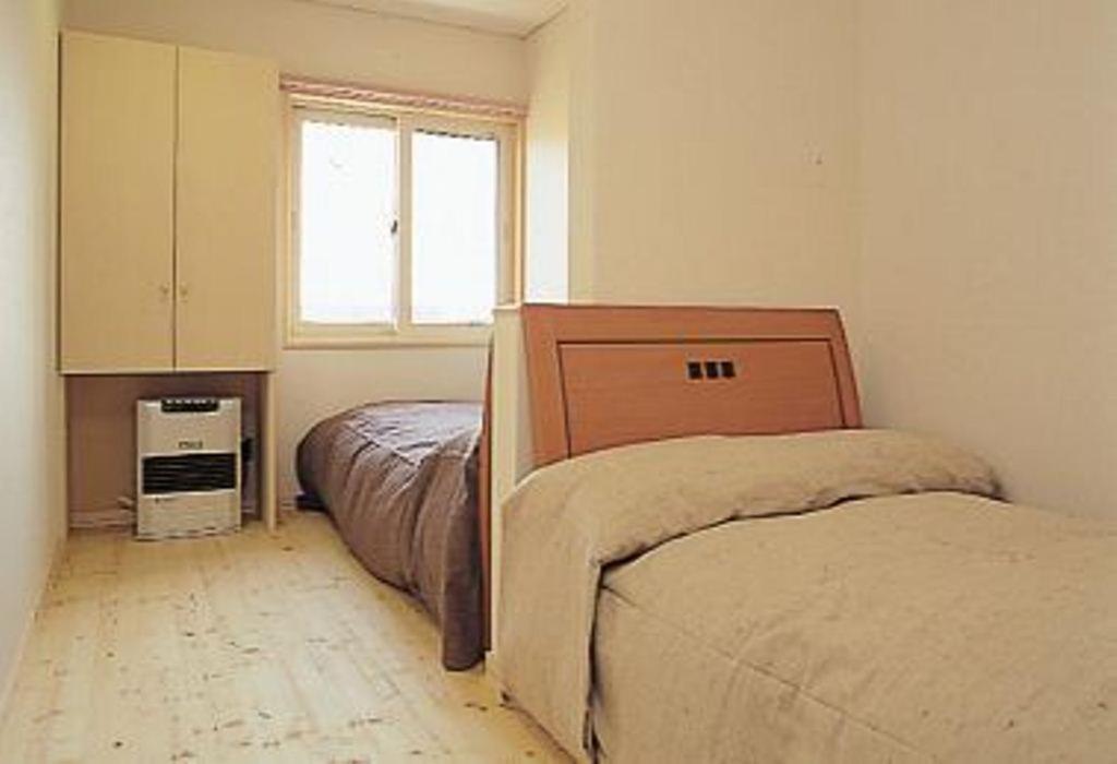 Ramina Hotel Нисеко Стая снимка